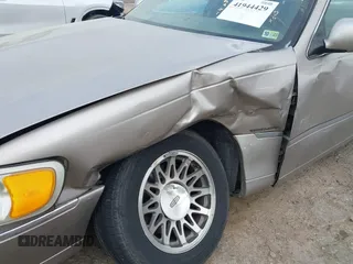 2001 Lincoln Town Car Signature with VIN 1LNHM82W21Y684197, listed as a IAAI auction lot 41944429 with 159,297 mi miles and . Bid and sale history available at DreamBid. Image 6.