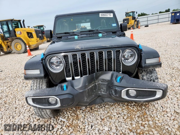 2022 Jeep Wrangler Unlimited Sahara with VIN 1C4JJXP61NW170425, listed as a Copart auction lot 60683715 with 51,847 mi miles and Salvage title. Bid and sale history available at DreamBid. Image 5.