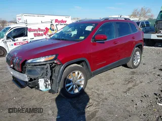 2014 Jeep Cherokee Limited with VIN 1C4PJMDB7EW219458, listed as a IAAI auction lot 41007909 with Not Provided miles and . Bid and sale history available at DreamBid. Image 2.