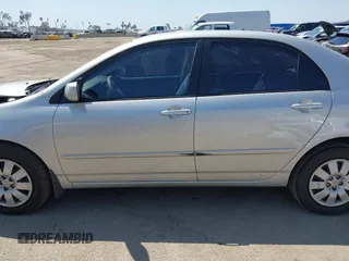 2004 Toyota Corolla CE with VIN 1NXBR32E14Z262676, listed as a IAAI auction lot 41992616 with 168,255 mi miles. Bid and sale history available at carsss.com. Image 14.