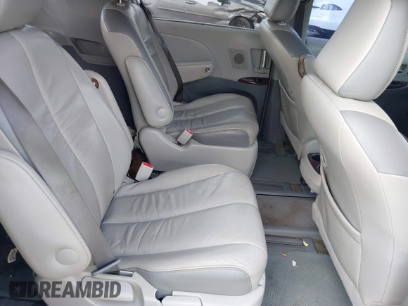 2011 Toyota Sienna XLE AAS with VIN 5TDYK3DC8BS157794, listed as a IAAI auction lot 40759823 with 211,716 mi miles and . Bid and sale history available at DreamBid. Image 8.