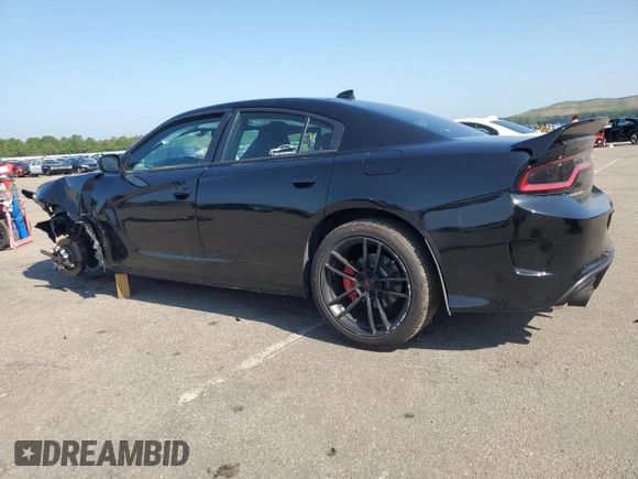 2016 Dodge Charger R/T with VIN 2C3CDXCT1GH204252, listed as a Copart auction lot 61090155 with 153,395 mi miles and Salvage title. Bid and sale history available at DreamBid. Image 2.