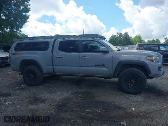 2021 Toyota Tacoma SR5 with VIN 3TMDZ5BN3MM112338, listed as a IAAI auction lot 42241704 with 81,346 mi miles and . Bid and sale history available at DreamBid. Image 13.