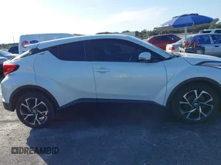 2021 Toyota C-HR LE with VIN NMTKHMBX0MR123981, listed as a IAAI auction lot 41273382 with 51,988 mi miles. Bid and sale history available at carsss.com. Image 13.