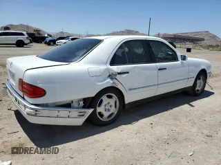 1999 Mercedes-Benz E-Class with VIN WDBJF70H5XA831773, listed as a Copart auction lot 71320244 with 145,181 mi miles and Salvage Title. Bid and sale history available at carsss.com. Image 3.