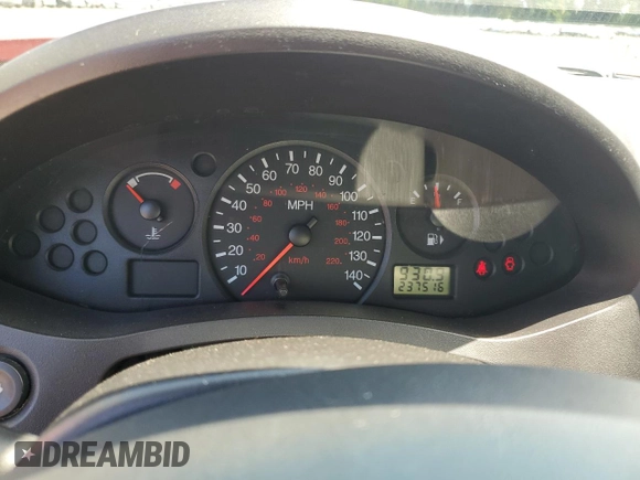 2007 Ford Focus S z VIN 1FAFP34NX7W360015, wystawiony jako Copart lot #57499655 z przebiegiem 237 516 mil mil oraz Szkoda całkowita • Salvage title. Historia ofert i sprzedaży dostępna na DreamBid. Obrazek 9.
