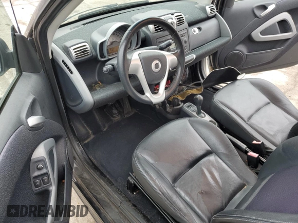 2008 Smart fortwo Pure z VIN WMEEJ31X58K178519, wystawiony jako Copart lot #52978925 z przebiegiem 50 975 mil mil oraz Szkody całkowita. Historia ofert i sprzedaży dostępna na DreamBid. Obrazek 8.