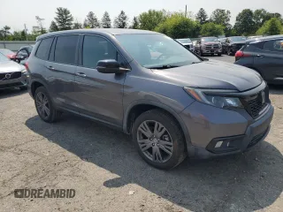 2019 Honda Passport EX-L with VIN 5FNYF8H51KB005843, listed as a Copart auction lot 59501565 with 47,051 mi miles and Salvage title. Bid and sale history available at DreamBid. Image 4.