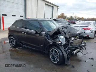 2015 MINI Paceman S with VIN WMWSS7C57FWN70700, listed as a IAAI auction lot 40940675 with 113,831 mi miles and . Bid and sale history available at DreamBid. Image 1.