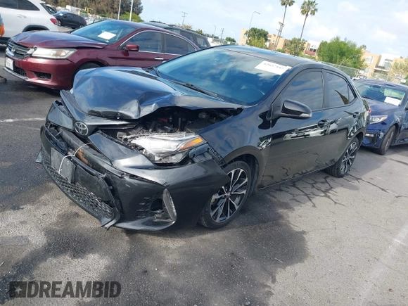 2019 Toyota Corolla L with VIN 5YFBURHE6KP892992, listed as a IAAI auction lot 42057187 with 80,304 mi miles and . Bid and sale history available at DreamBid. Image 2.