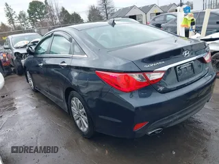 2014 Hyundai Sonata Limited with VIN 5NPEC4ABXEH934116, listed as a IAAI auction lot 41546415 with 105,136 mi miles and . Bid and sale history available at DreamBid. Image 3.