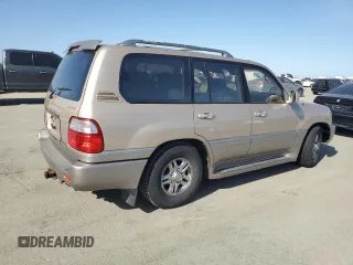 2001 Lexus LX 470 z VIN JTJHT00W213507042, wystawiony jako Copart lot #52634195 z przebiegiem 179 707 mil mil oraz Tytuł czysty. Historia ofert i sprzedaży dostępna na DreamBid. Obrazek 3.