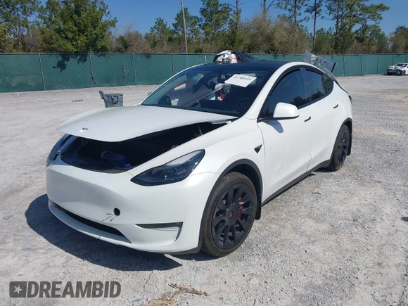 2023 Tesla Model Y Long Range with VIN 7SAYGAEE1PF665934, listed as a IAAI auction lot 41780949 with 21,949 mi miles and . Bid and sale history available at DreamBid. Image 16.