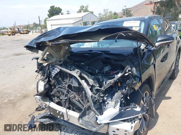 2020 Lexus RX 450h с VIN 2T2HGMDA5LC052075, выставлен на аукционе IAAI как лот 42407001 с пробегом 105 686 миль миль и . История ставок и продаж доступна на DreamBid. Изображение 12.