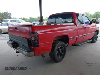 1998 Dodge 1500 with VIN 1B7HC13Z4WJ104617, listed as a IAAI auction lot 42021809 with 270,710 mi miles and . Bid and sale history available at DreamBid. Image 4.