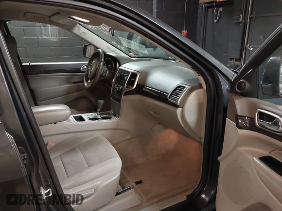 2011 Jeep Grand Cherokee 70th Anniversary with VIN 1J4RR4GG3BC566690, listed as a IAAI auction lot 41810545 with 173,886 mi miles. Bid and sale history available at carsss.com. Image 5.