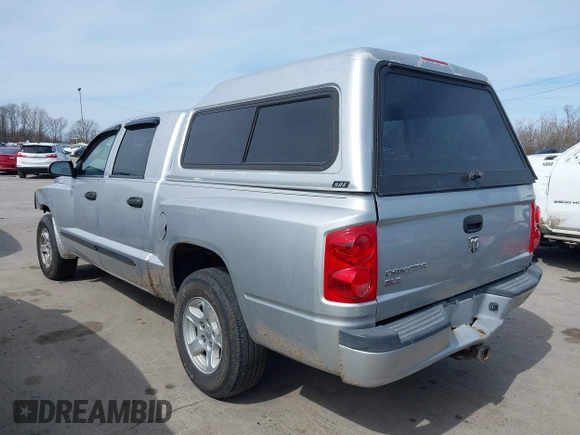 2007 Dodge Dakota SLT with VIN 1D7HE48K57S147503, listed as a IAAI auction lot 41858271 with 242,534 mi miles and . Bid and sale history available at DreamBid. Image 3.