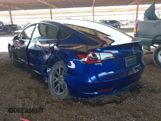 2023 Tesla Model 3 z VIN 5YJ3E1EA2PF557011, wystawiony jako IAAI lot #42347980 z przebiegiem 15 358 mil mil oraz . Historia ofert i sprzedaży dostępna na DreamBid. Obrazek 3.