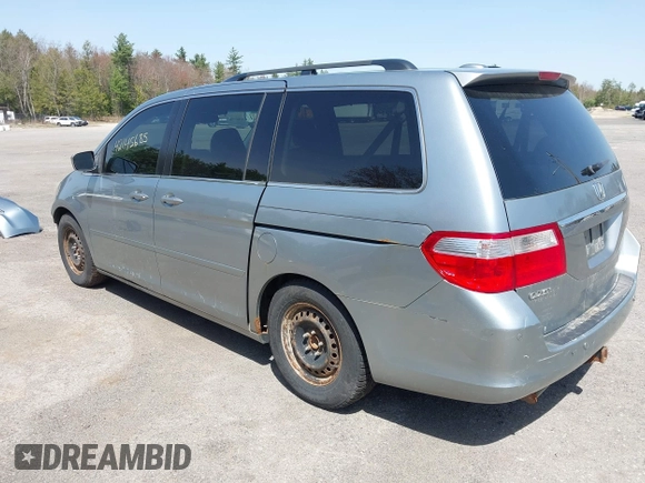 2007 Honda Odyssey Touring with VIN 5FNRL38867B122822, listed as a IAAI auction lot 42145685 with 212,164 mi miles. Bid and sale history available at carsss.com. Image 3.
