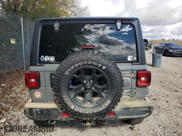2022 Jeep Wrangler Unlimited Willys with VIN 1C4HJXDG5NW103726, listed as a Copart auction lot 75965134 with 21,536 mi miles and Salvage Title. Bid and sale history available at DreamBid. Image 6.