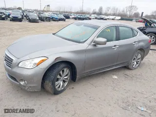 2012 Infiniti M37 with VIN JN1BY1AR5CM392834, listed as a IAAI auction lot 41486899 with 117,289 mi miles. Bid and sale history available at carsss.com. Image 2.