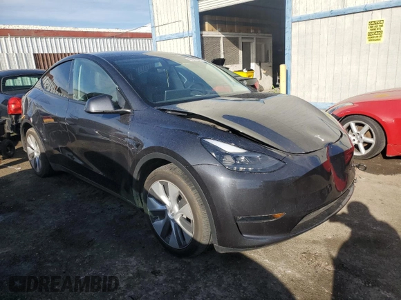 2024 Tesla Model Y Long Range with VIN 7SAYGDEE2RA252101, listed as a Copart auction lot 49514675 with 19,399 mi miles and Salvage Title. Bid and sale history available at DreamBid. Image 4.