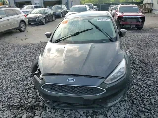 2016 Ford Focus SE z VIN 1FADP3F24GL313333, wystawiony jako Copart lot #60023715 z przebiegiem Nie podano mil oraz Szkoda całkowita • Salvage title. Historia ofert i sprzedaży dostępna na DreamBid. Obrazek 13.