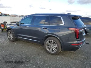 2021 Cadillac XT6 Premium Luxury with VIN 1GYKPERS3MZ150928, listed as a Copart auction lot 86551144 with 12,311 mi miles and Salvage title. Bid and sale history available at DreamBid. Image 2.
