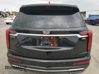 2021 Cadillac XT6 Premium Luxury z VIN 1GYKPERS0MZ181151, wystawiony jako Copart lot #78808104 z przebiegiem 31 697 mil mil oraz Szkoda całkowita • Salvage title. Historia ofert i sprzedaży dostępna na DreamBid. Obrazek 6.