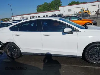 2014 Ford Fusion S with VIN 1FA6P0G79E5383039, listed as a IAAI auction lot 42037262 with 192,400 mi miles and . Bid and sale history available at DreamBid. Image 13.