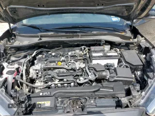 2023 Toyota Corolla Cross XLE with VIN 7MUDAAAG2PV072301, listed as a Copart auction lot 63484815 with 25,017 mi miles and Salvage title. Bid and sale history available at DreamBid. Image 12.