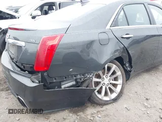2018 Cadillac CTS Luxury AWD z VIN 1G6AX5SS6J0111510, wystawiony jako IAAI lot #41501384 z przebiegiem 68 315 mil mil oraz . Historia ofert i sprzedaży dostępna na DreamBid. Obrazek 6.