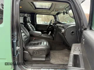 2005 Hummer H2 z VIN 5GRGN22U85107767, wystawiony jako Copart lot #56570325 z przebiegiem 197 076 mil mil oraz Tytuł czysty. Historia ofert i sprzedaży dostępna na DreamBid. Obrazek 5.