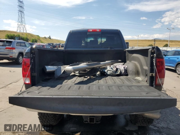 2014 Ram 2500 Laramie with VIN 3C6UR5NL5EG144483, listed as a Copart auction lot 73720324 with 137,360 mi miles and Salvage title. Bid and sale history available at DreamBid. Image 6.