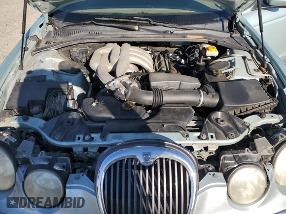 2003 Jaguar S-Type with VIN SAJEA01T93FM46260, listed as a Copart auction lot 87573835 with 129,563 mi miles and Clean Title. Bid and sale history available at DreamBid. Image 11.