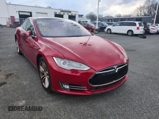 2013 Tesla Model S с VIN 5YJSA1DN6DFP26504, выставлен на аукционе IAAI как лот 41703859 с пробегом 135 552 миль миль и . История ставок и продаж доступна на DreamBid. Изображение 2.