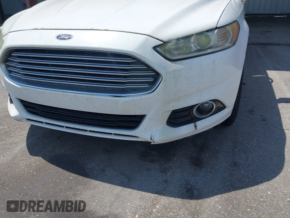 2013 Ford Fusion Titanium with VIN 3FA6P0K92DR184841, listed as a IAAI auction lot 42196408 with 250,718 mi miles and . Bid and sale history available at DreamBid. Image 6.