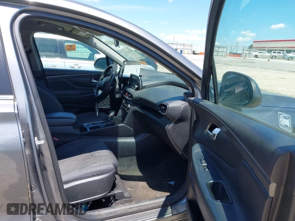 2019 Hyundai Santa Fe SE with VIN 5NMS23AD3KH083786, listed as a IAAI auction lot 42196828 with Not Provided miles and . Bid and sale history available at DreamBid. Image 5.