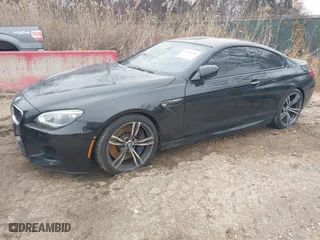 2014 BMW M6 with VIN WBSLX9C58ED160558, listed as a IAAI auction lot 41553209 with 154,789 mi miles. Bid and sale history available at carsss.com. Image 2.