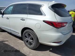 2016 Infiniti QX60 with VIN 5N1AL0MM6GC520846, listed as a IAAI auction lot 41795826 with 81,190 mi miles and . Bid and sale history available at DreamBid. Image 3.