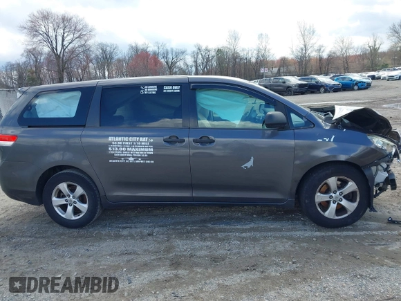 2014 Toyota Sienna L with VIN 5TDZK3DC4ES407928, listed as a IAAI auction lot 41887349 with 208,289 mi miles. Bid and sale history available at carsss.com. Image 13.