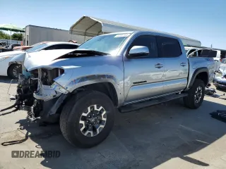 2023 Toyota Tacoma SR z VIN 3TMCZ5AN0PM653445, wystawiony jako Copart lot #65987805 z przebiegiem 20 465 mil mil oraz Szkoda całkowita • Salvage title. Historia ofert i sprzedaży dostępna na DreamBid. Obrazek 1.