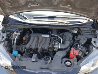 2015 Honda Fit LX with VIN 3HGGK5G54FM731965, listed as a IAAI auction lot 42655355 with 141,205 mi miles and . Bid and sale history available at DreamBid. Image 10.
