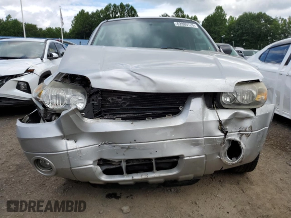 2005 Ford Escape Limited with VIN 1FMCU94165KA11181, listed as a Copart auction lot 62880725 with 180,152 mi miles and Salvage title. Bid and sale history available at DreamBid. Image 5.