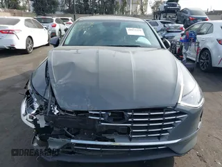 2022 Hyundai Sonata Hybrid Blue with VIN KMHL24JJ5NA037502, listed as a IAAI auction lot 40975379 with 69,018 mi miles. Bid and sale history available at carsss.com. Image 13.