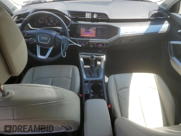 2020 Audi Q3 Premium with VIN WA1AECF32L1031641, listed as a Copart auction lot 60266275 with 43,730 mi miles and Salvage title. Bid and sale history available at DreamBid. Image 8.