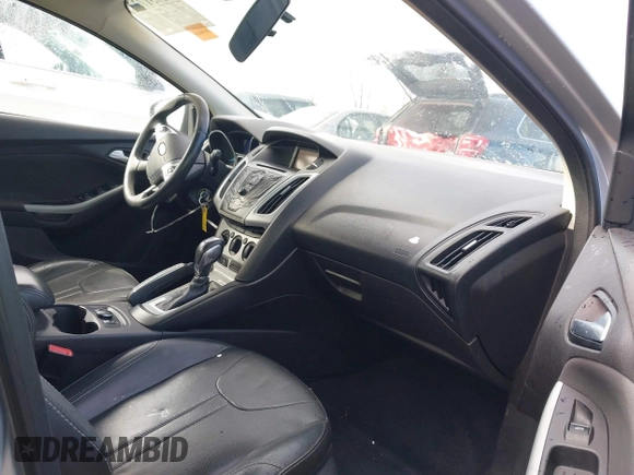2013 Ford Focus SE with VIN 1FADP3K27DL203880, listed as a IAAI auction lot 41951733 with 131,880 mi miles. Bid and sale history available at carsss.com. Image 5.