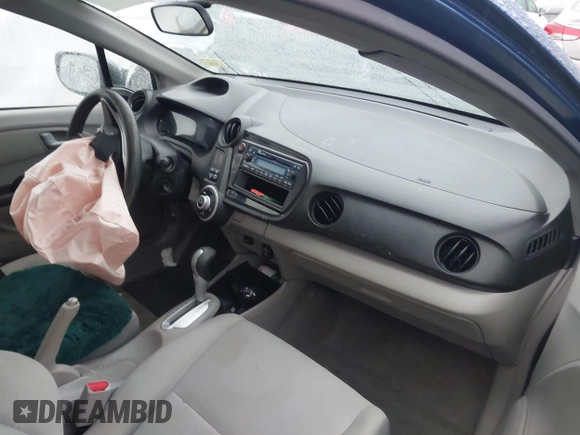 2012 Honda Insight with VIN JHMZE2H31CS005377, listed as a IAAI auction lot 41879122 with 136,646 mi miles and . Bid and sale history available at DreamBid. Image 5.