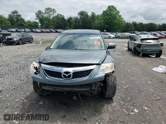 2011 Mazda CX-9 Grand Touring с VIN JM3TB2DA2B0311879, выставлен на аукционе Copart как лот 56294315 с пробегом 231 716 миль миль и Чистый • Clean title. История ставок и продаж доступна на DreamBid. Изображение 14.