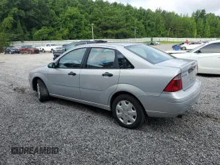 2005 Ford Focus S with VIN 1FAFP34N55W115653, listed as a Copart auction lot 63043315 with 110,593 mi miles and Salvage title. Bid and sale history available at DreamBid. Image 2.